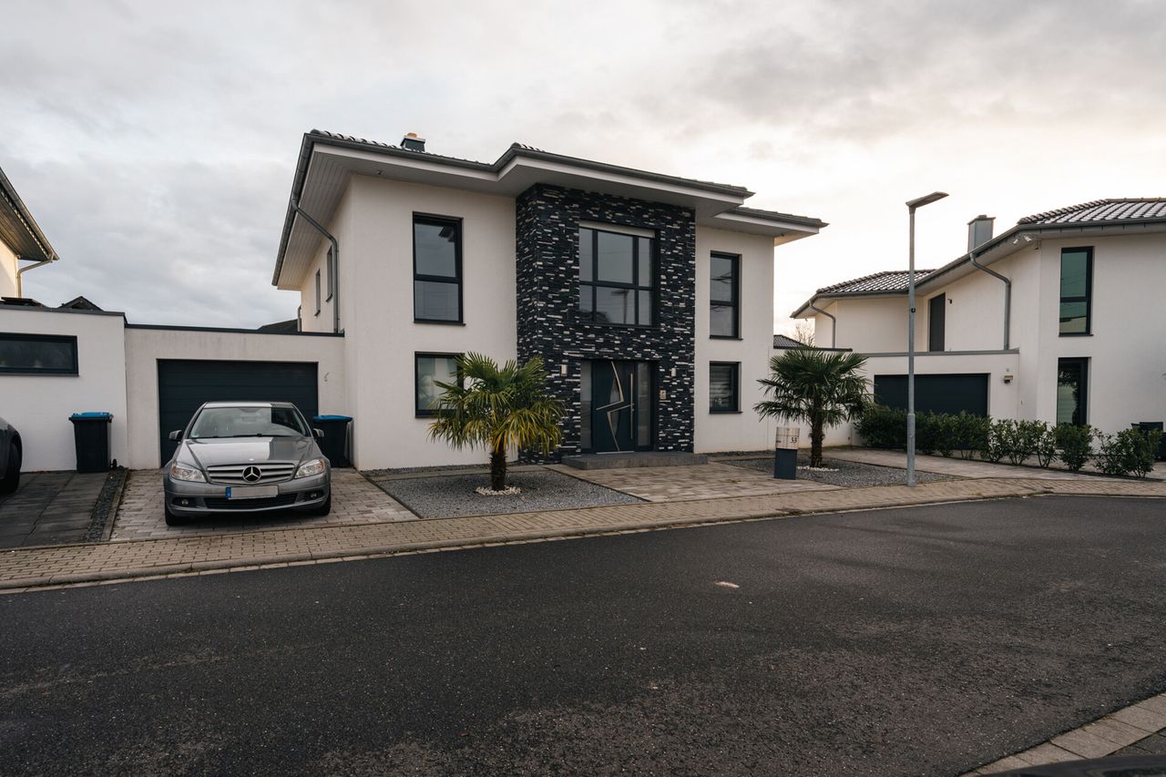 Exklusives Familienzuhause mit Pool, hochwertiger Ausstattung und luxuriösem Wohnkomfort