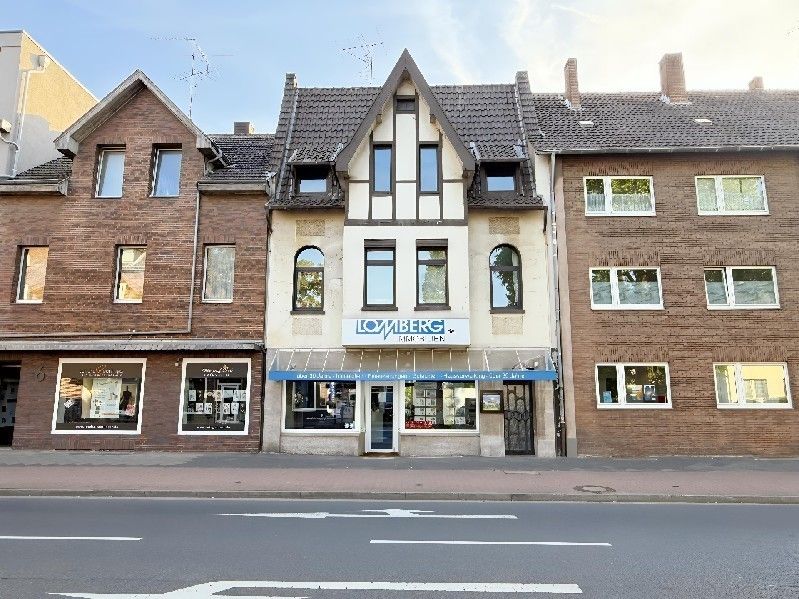 WOHN-/GESCHÄFTSHAUS IN ZENTRALER LAGE VON MEERBUSCH BÜDERICH MIT FREIWERDENDEM LADENLOKAL